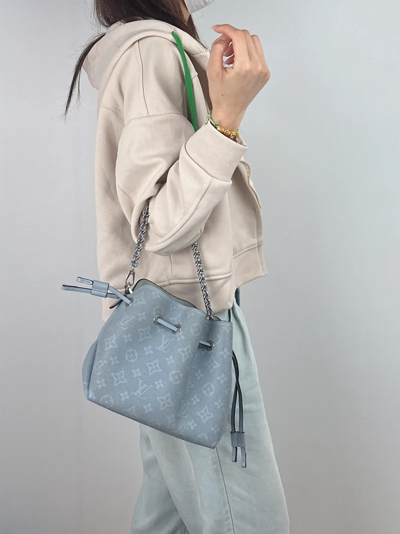 Louis Vuitton Crossbody Bag BELLA Blue Calfskin 22 × 14 × 20 cm — on-model view 3 of 3