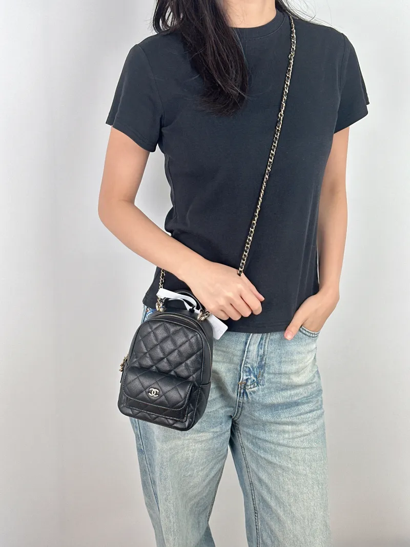 Chanel Crossbody Bag Mini Backpack Crossbody Bag Black Grained Calfskin One Size 13 × 9 × 18 cm — on-model view 1 of 3