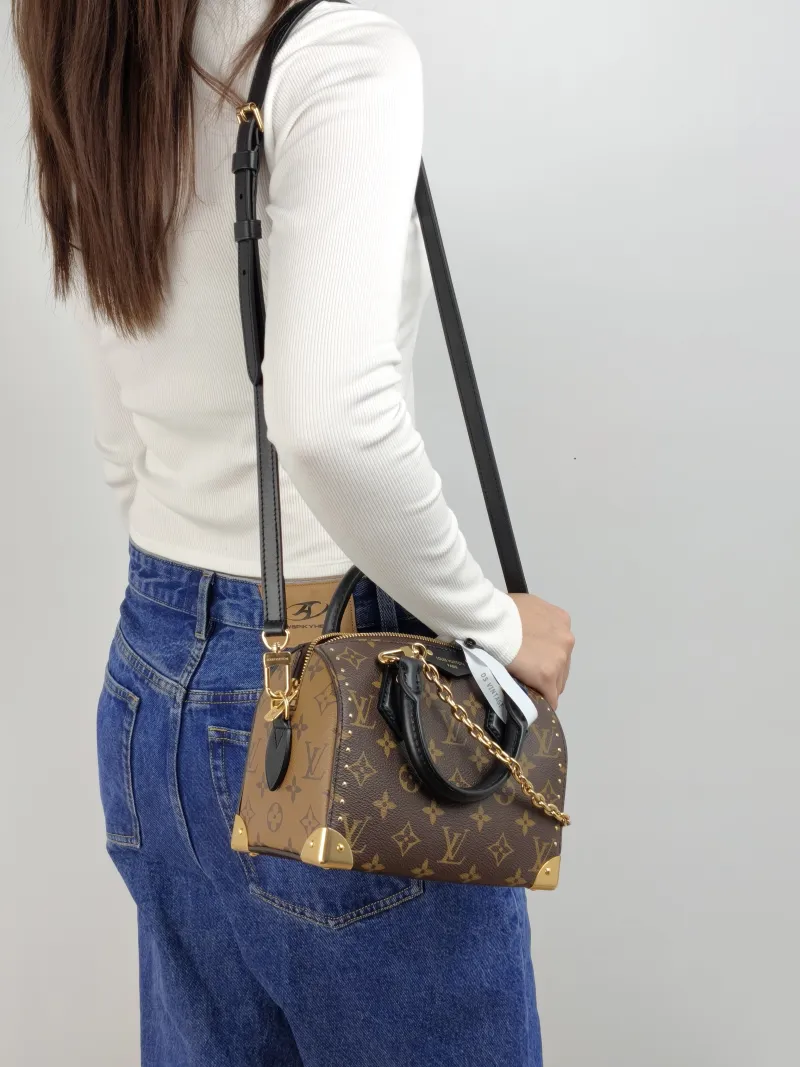 Louis Vuitton Crossbody Bag Speedy Trunk 20 Monogram PVC Small 20.5 × 11 × 13.5 cm — on-model view 1 of 3
