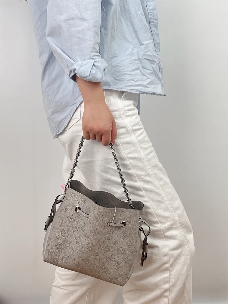 Louis Vuitton Crossbody Bag BELLA Grey Calfskin One Size 22 × 14 × 19 cm — on-model view 1 of 2