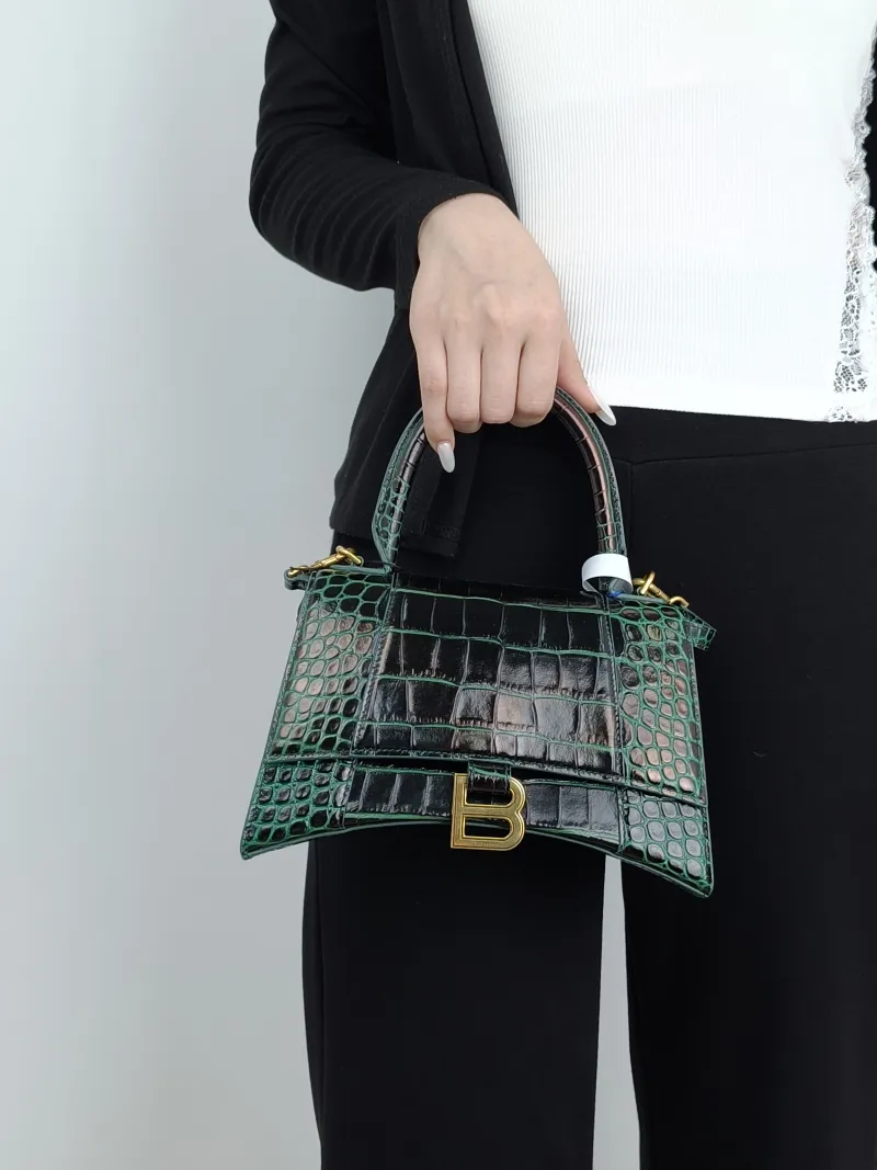BALENCIAGA Crossbody Bag Hourglass Hourglass Bag Green Calfskin Small23 × 10 × 14 cm — on-model view 2 of 3