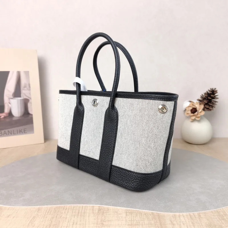 Hermès Top Handle Bag Neo Garden 23 Mini Black · Beige Canvas · Negonda Calfskin Mini 23 × 10 × 16 cm G — cover view 6 of 6