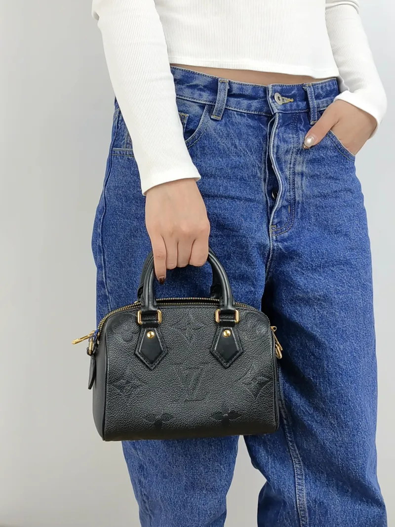 Louis Vuitton Crossbody Bag Speedy20 Black Monogram Empreinte Embossed Calfskin Small 20.5 × 12 × 13.5 cm — on-model view 1 of 3