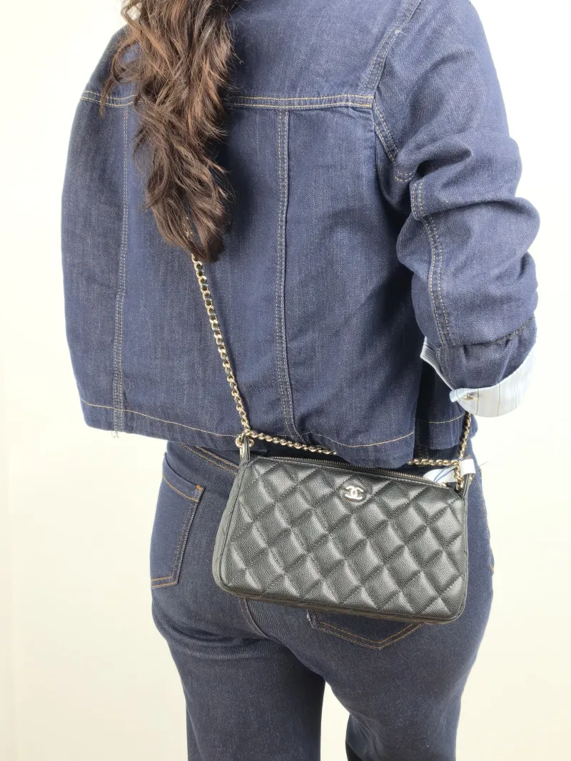 Chanel Crossbody Bag Black Grained Calfskin 21 × 5.5 × 12 cm — on-model view 1 of 2