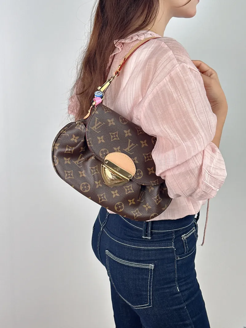 Louis Vuitton Shoulder Bag Sunset Monogram PVC One Size 27 × 3 × 18 cm — on-model view 1 of 2