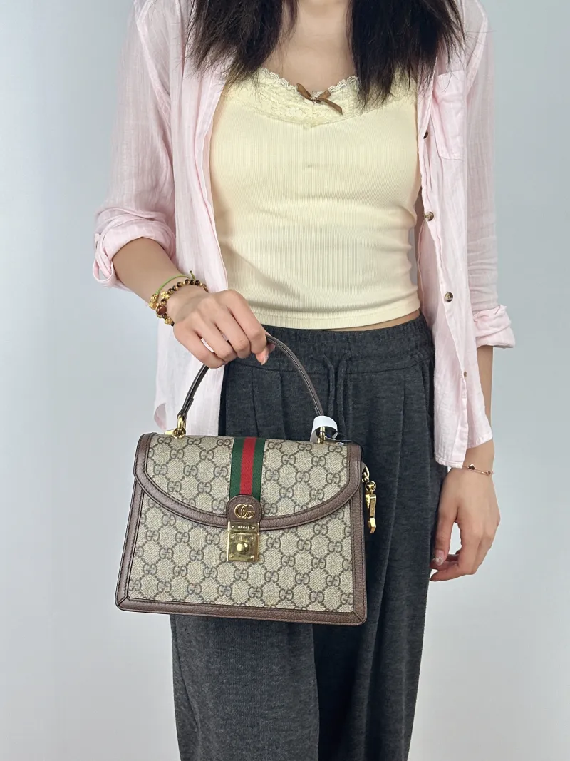 GUCCI Top Handle Bag Ophidia GG Messenger Bag Monogram PVC Medium25 × 7 × 17.5 cm — on-model view 2 of 2