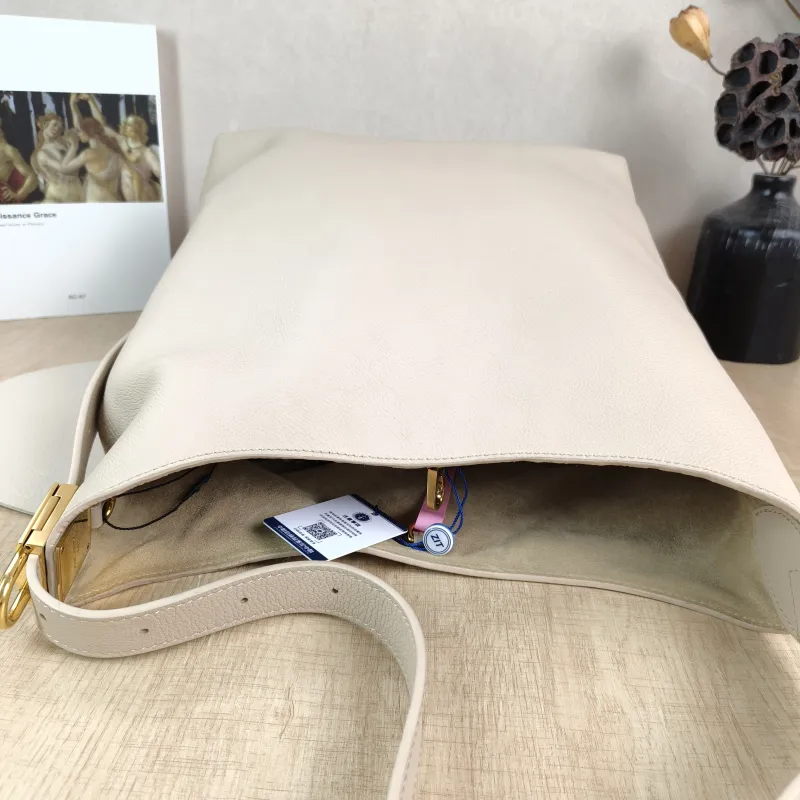 Louis Vuitton Shoulder Bag Low Key Hobo Shoulder Bag White Calfskin Medium 31 × 18 × 35 cm — detail view 1 of 12