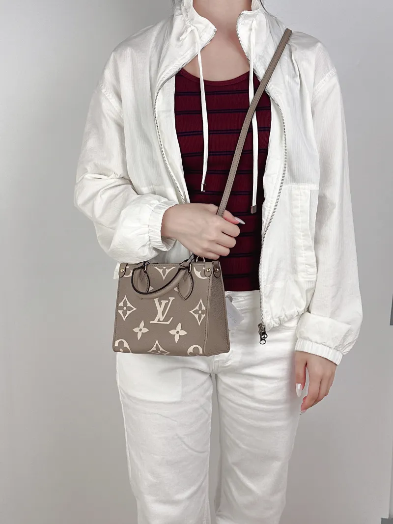 Louis Vuitton Crossbody Bag Onthego BB · White Empreinte Embossed Calfskin Monogram BB18 × 8.5 × 15 cm — on-model view 3 of 3