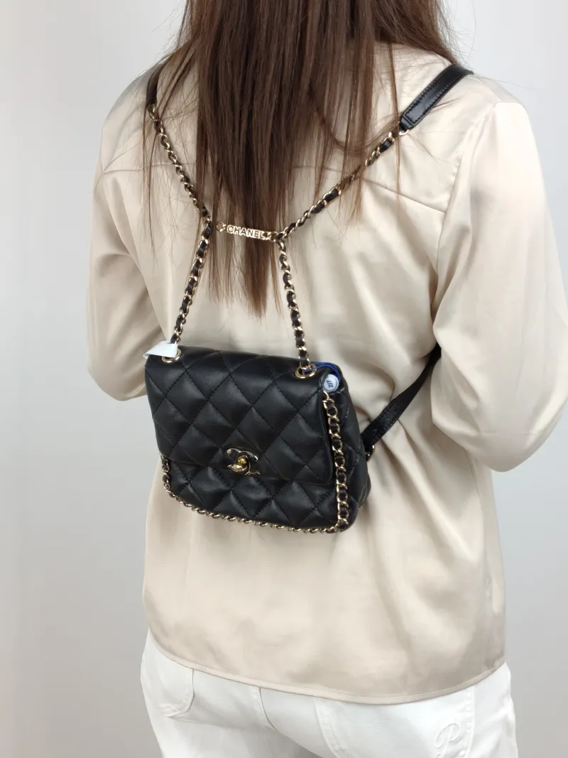 Chanel Backpack logo Backpack Black Lambskin 19 × 6 × 17 cm — on-model view 1 of 3