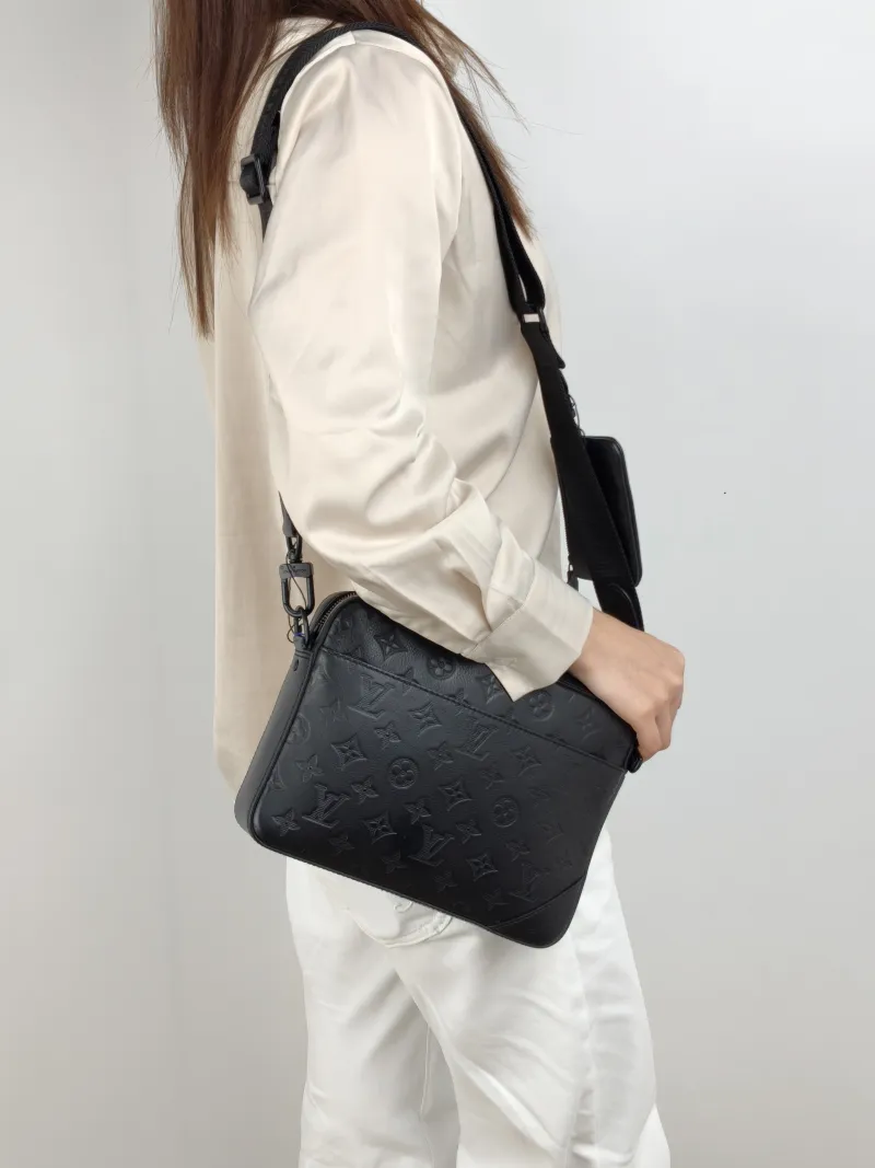Louis Vuitton Shoulder Bag Duo Messenger Messenger Bag Black Calfskin 26 × 4.5 × 18.5 cm — on-model view 2 of 2