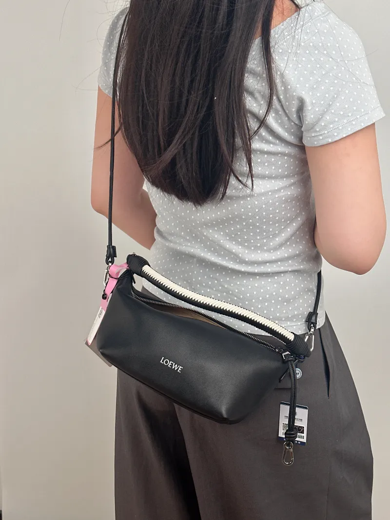 LOEWE Shoulder Bag Cala Woven Black White Lambskin Mini 26 × 10 × 13 cm — on-model view 3 of 3
