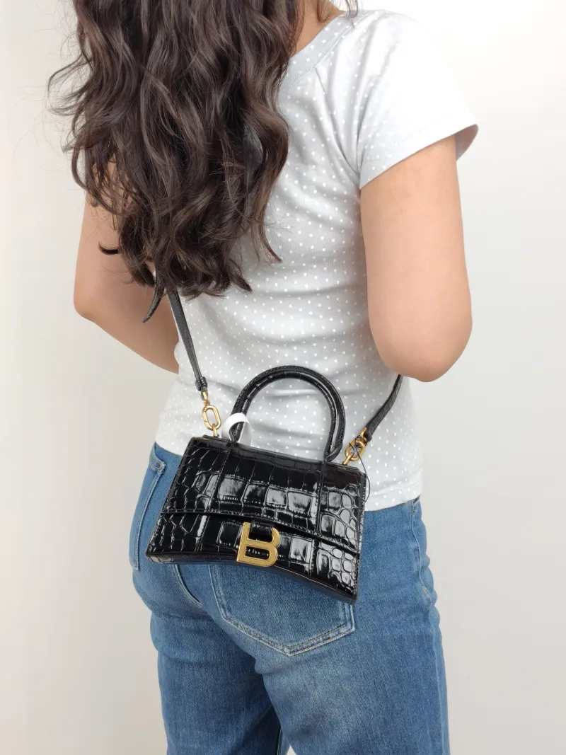 BALENCIAGA Crossbody Bag Hourglass Hourglass Bag Black Calfskin XS 19 × 8 × 13 cm — on-model view 2 of 2