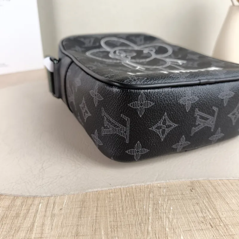 Louis Vuitton Crossbody Bag Danube Messenger Bag Monogram · Vivienne PVC Small 16 × 7 × 22 cm — detail view 7 of 11