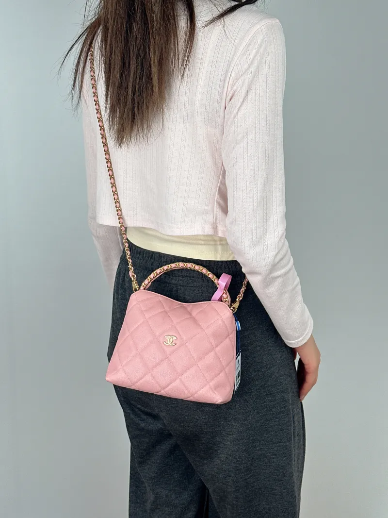 Chanel Crossbody Bag Woven Pink Grained Calfskin One Size18.5 × 7 × 14.5 cm — on-model view 2 of 2