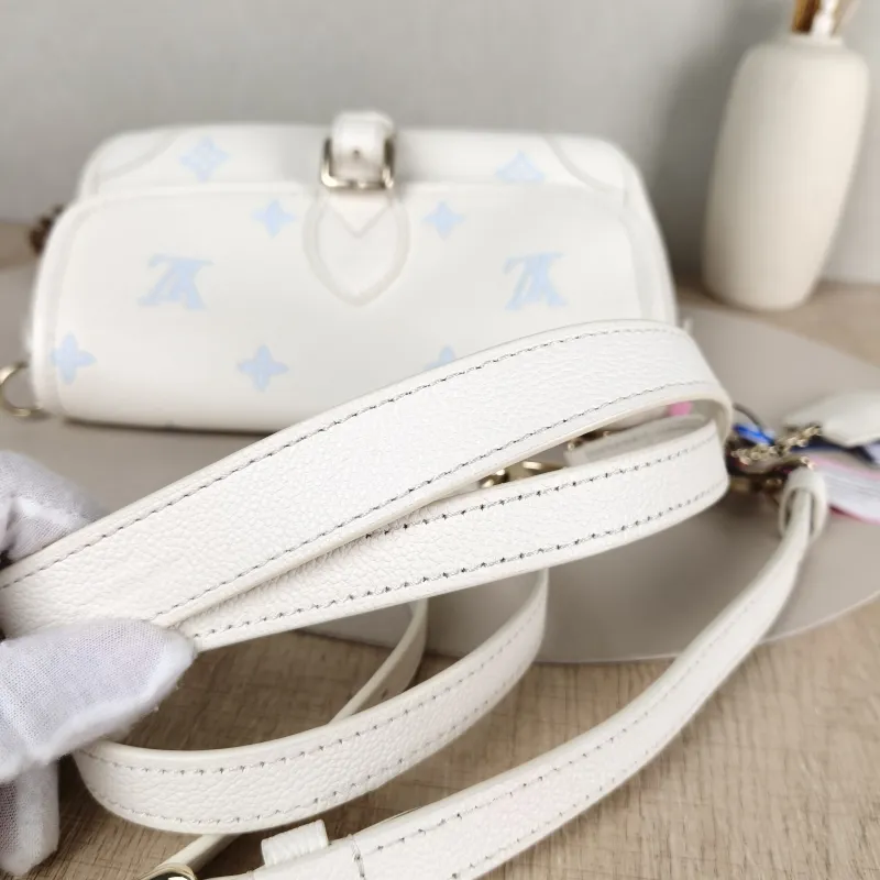 Louis Vuitton Crossbody Bag Diane Baguette Bag White · Blue Empreinte Embossed Calfskin Small 24 × 9 × 15 cm — detail view 6 of 13