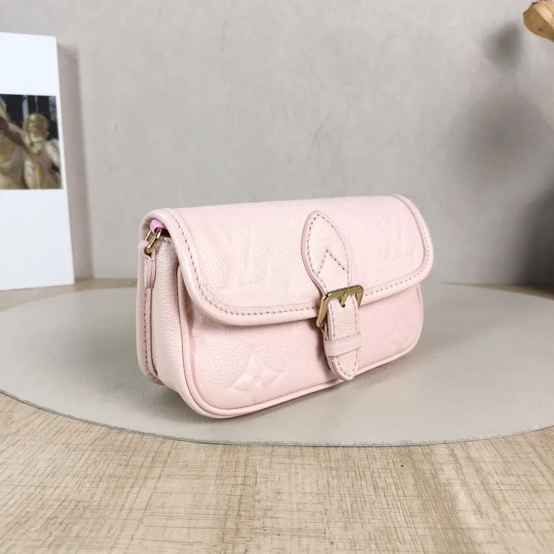 Louis Vuitton Crossbody Bag Diane Baguette Bag Monogram Empreinte Embossed Calfskin nano 19 × 6 × 10.5 cm — cover view 4 of 5