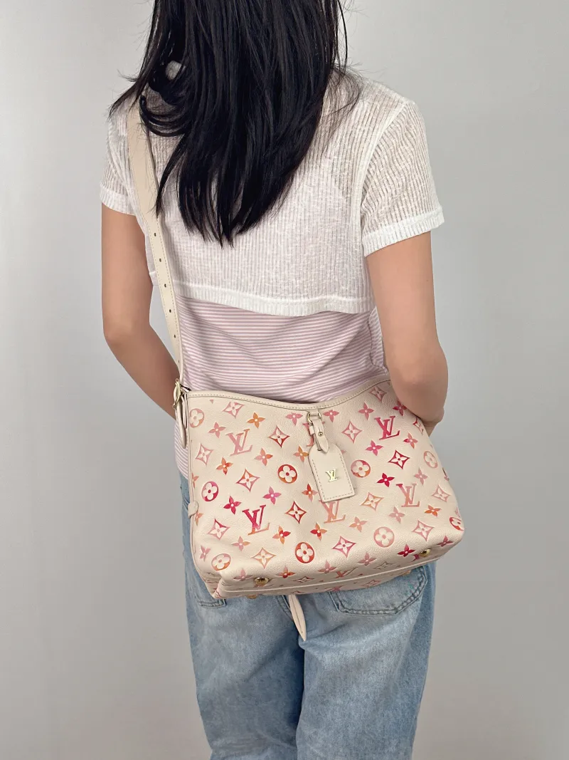 Louis Vuitton Crossbody Bag Carryall Calfskin Small 29.5 × 12 × 24 cm — on-model view 1 of 2