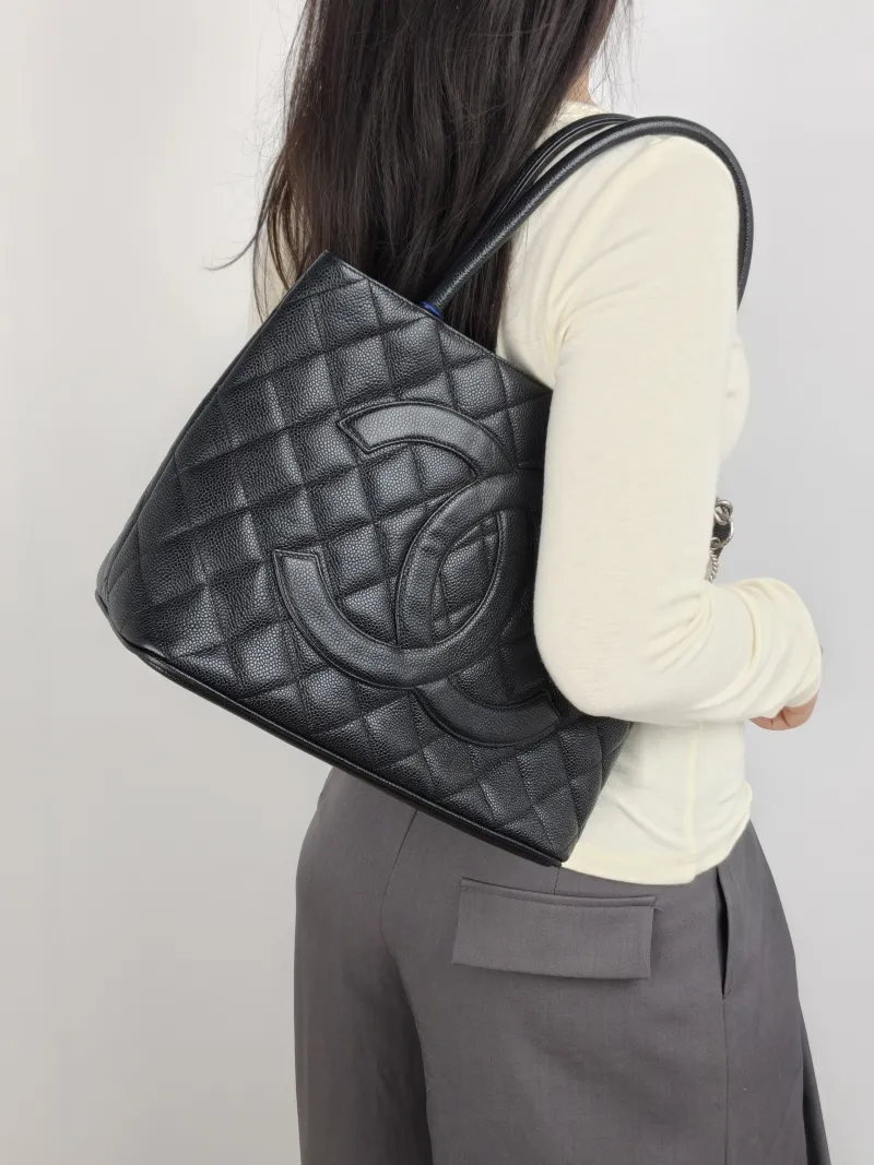 Chanel Top Handle Bag Medallion Black Grained Calfskin Large 30 × 15 × 24 cm 6 — on-model view 2 of 2
