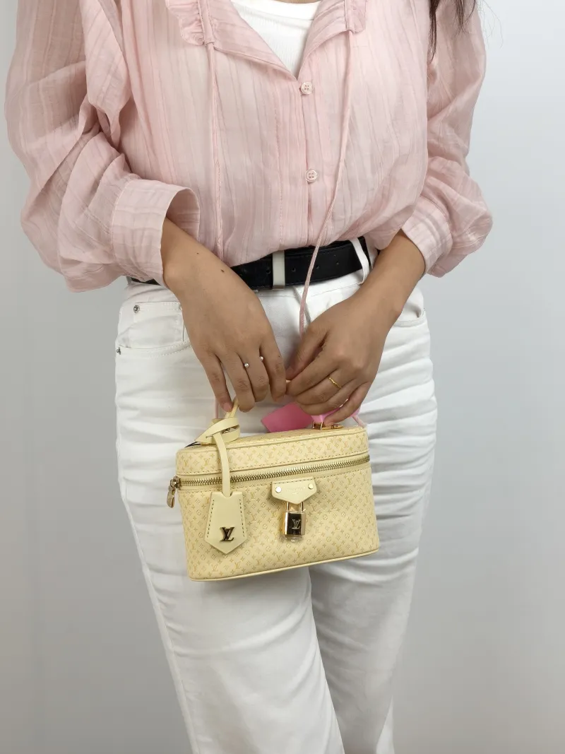 Louis Vuitton Shoulder Bag VANITY POUCH Cosmetic Bag Calfskin One Size 19 × 6.5 × 11.5 cm — on-model view 1 of 2