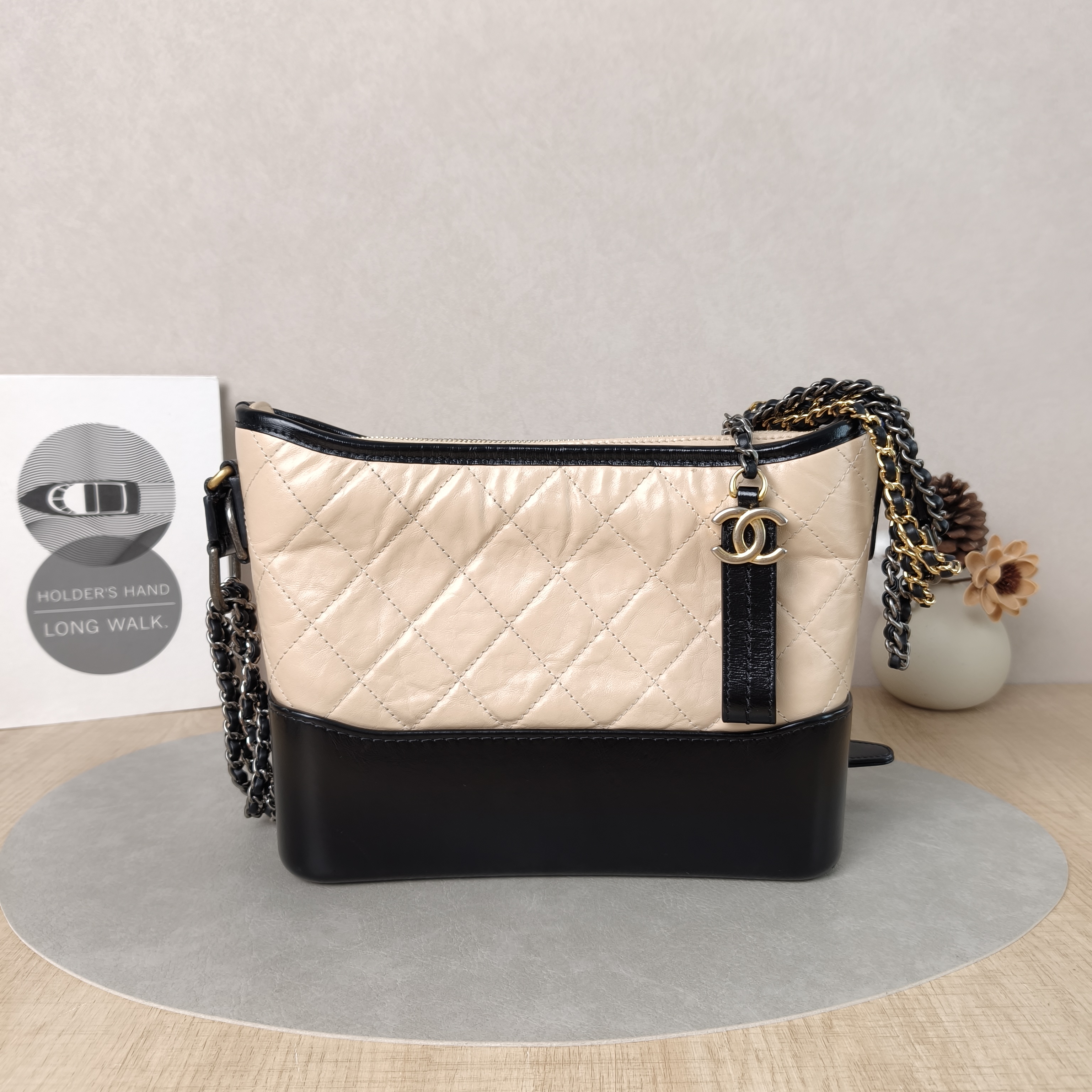 Chanel Crossbody Bag Gabrielle Gabrielle Bag Beige Black CC alfskin Medium26 × 9 × 20 cm