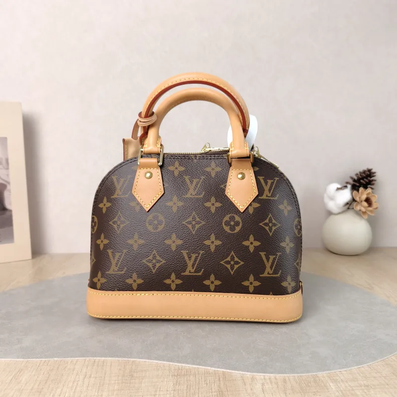 Louis Vuitton Crossbody Bag Alma BB Monogram PVC BB 23.5 × 11.5 × 17.5 cm — cover view 6 of 6