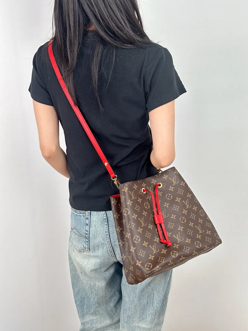 Louis Vuitton Shoulder Bag NÉONOÉ Bucket Bag PVC Medium 26 × 17.5 × 26 cm — on-model view 1 of 2