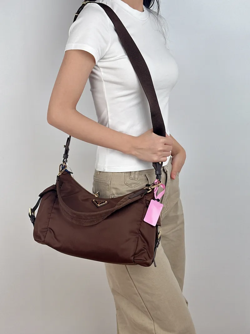 PRADA Shoulder Bag Explore Messenger Bag Nylon Large 32 × 11.5 × 22 cm — on-model view 1 of 3