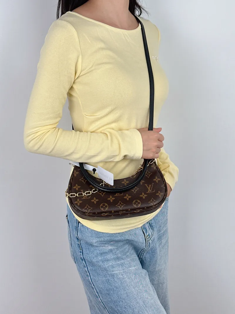 Louis Vuitton Shoulder Bag Catchy Monogram PVC Small 24 × 6 × 10 cm — on-model view 2 of 3