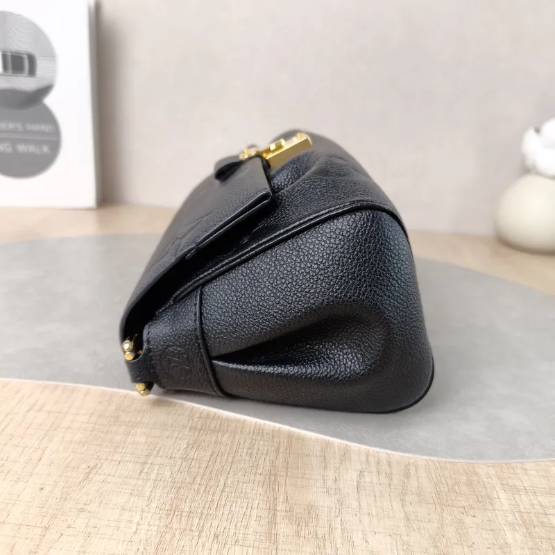 Louis Vuitton Crossbody Bag Favorite Black Monogram Empreinte Embossed Calfskin Medium 24 × 9 × 14 cm — detail view 12 of 12