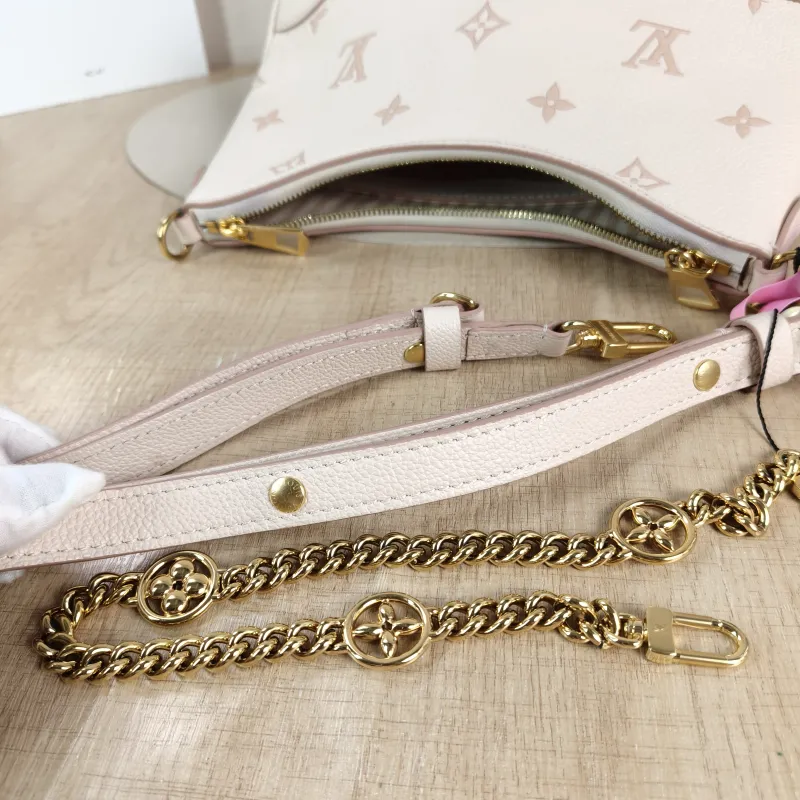 Louis Vuitton Crossbody Bag Boulogne Beige Monogram Empreinte Embossed Calfskin Small 26 × 9.5 × 16 cm — detail view 10 of 11
