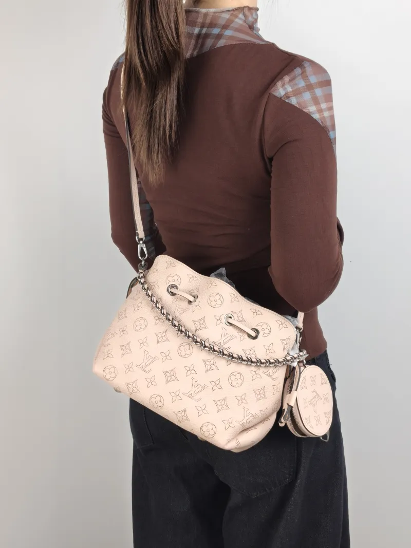 Louis Vuitton Crossbody Bag BELLA Pink Calfskin One Size 22 × 14 × 19 cm — on-model view 1 of 2