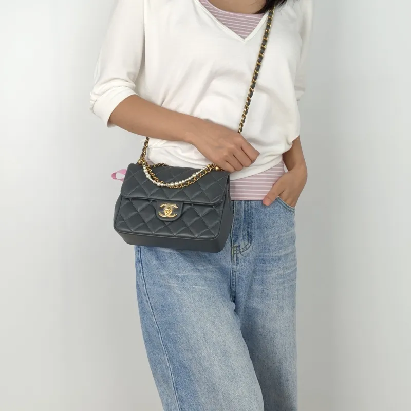 Chanel Crossbody Bag Pearl Grey Lambskin One Size19.5 × 7.5 × 14.5 cm — on-model view 2 of 3