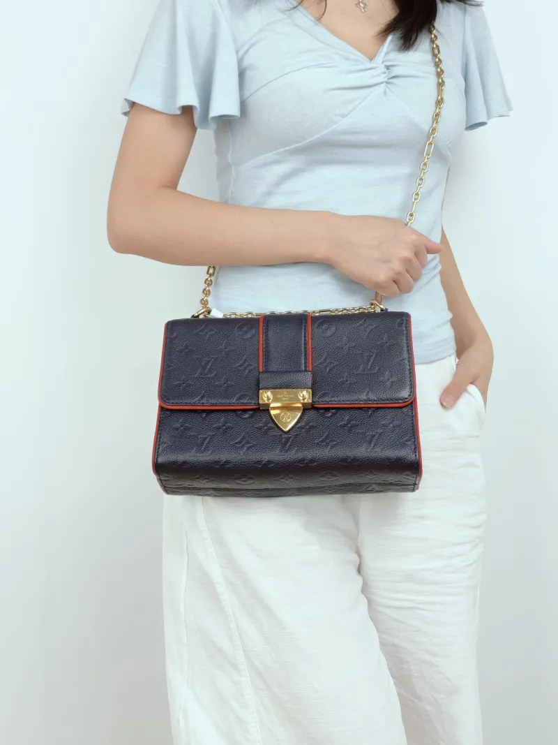 Louis Vuitton Crossbody Bag SAINT SULPICE · Calfskin Small25 × 9 × 17 cm — on-model view 1 of 3