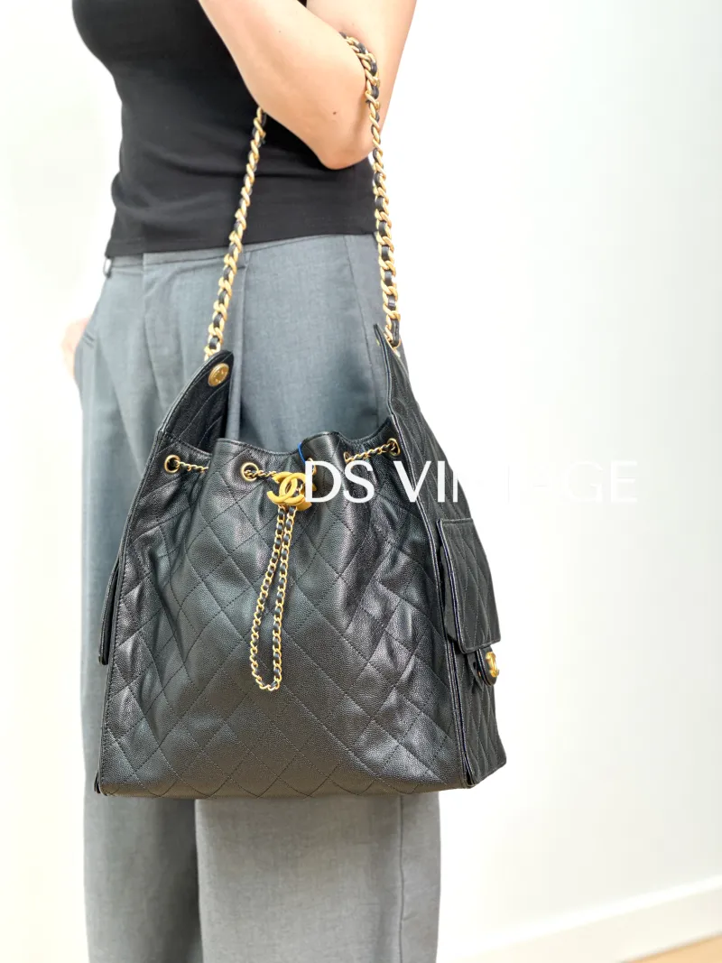 Chanel Shoulder Bag 25Bag Black Grained Calfskin Medium 30 × 15 × 40 cm — on-model view 1 of 3