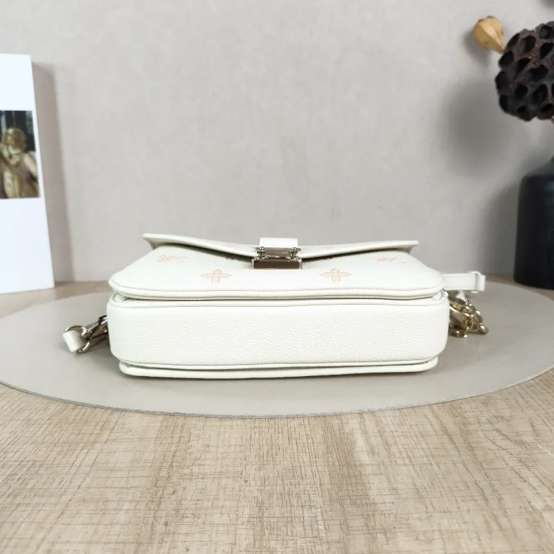 Louis Vuitton Crossbody Bag Pochette Métis East West White · Pink Monogram Empreinte Embossed Calfskin Small21.5 × 6 × 13.5 cm — cover view 3 of 5