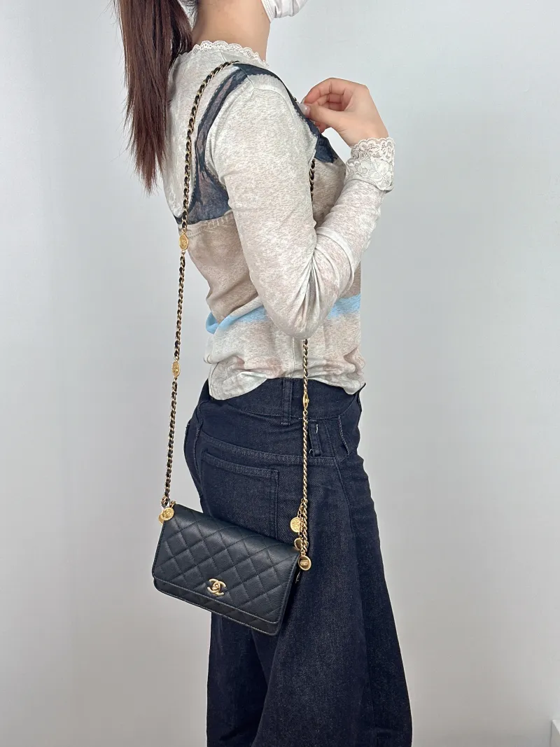 Chanel Crossbody Bag CF WOC Black Grained Calfskin One Size19.2 × 3.5 × 12.3 cm — on-model view 2 of 2