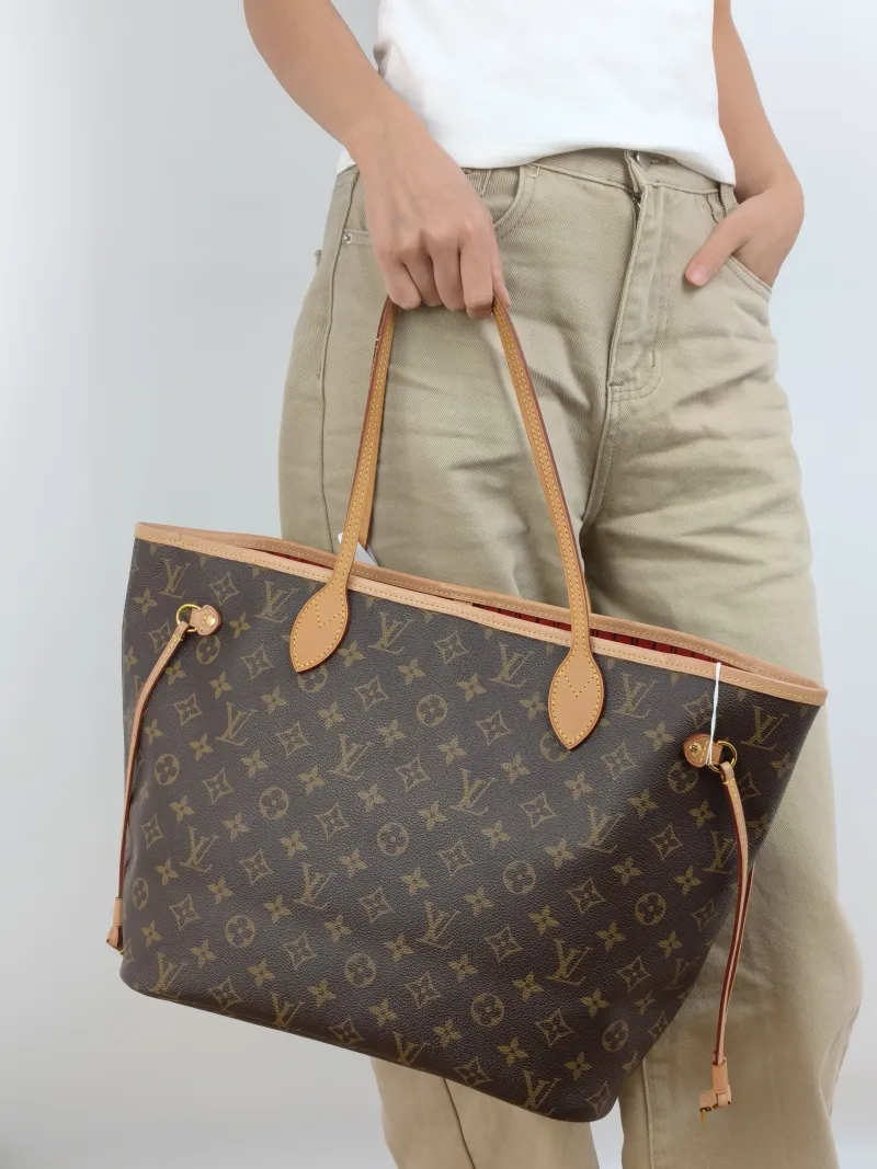 Louis Vuitton Shoulder Bag Neverfull Monogram PVC Medium 31 × 14 × 28 cm — on-model view 2 of 2