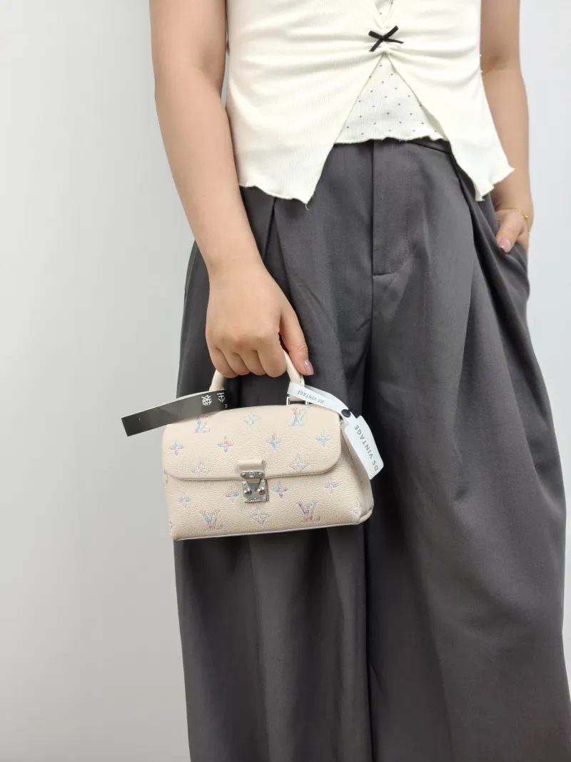Louis Vuitton Crossbody Bag MADELEINE Calfskin nano 21 × 6 × 12.5 cm — on-model view 3 of 3