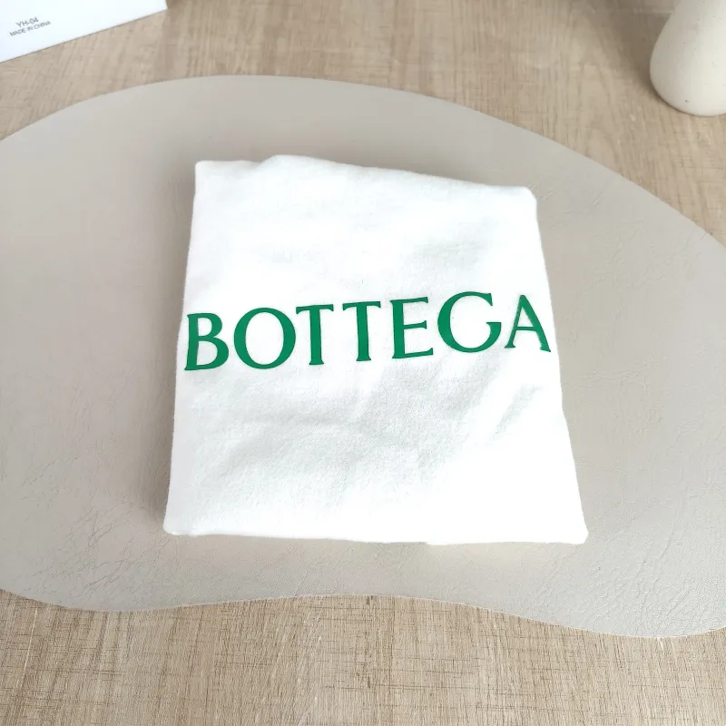 Bottega Veneta Top Handle Bag Jodie Beige Lambskin Mini 28 × 8 × 23 cm — detail view 1 of 10