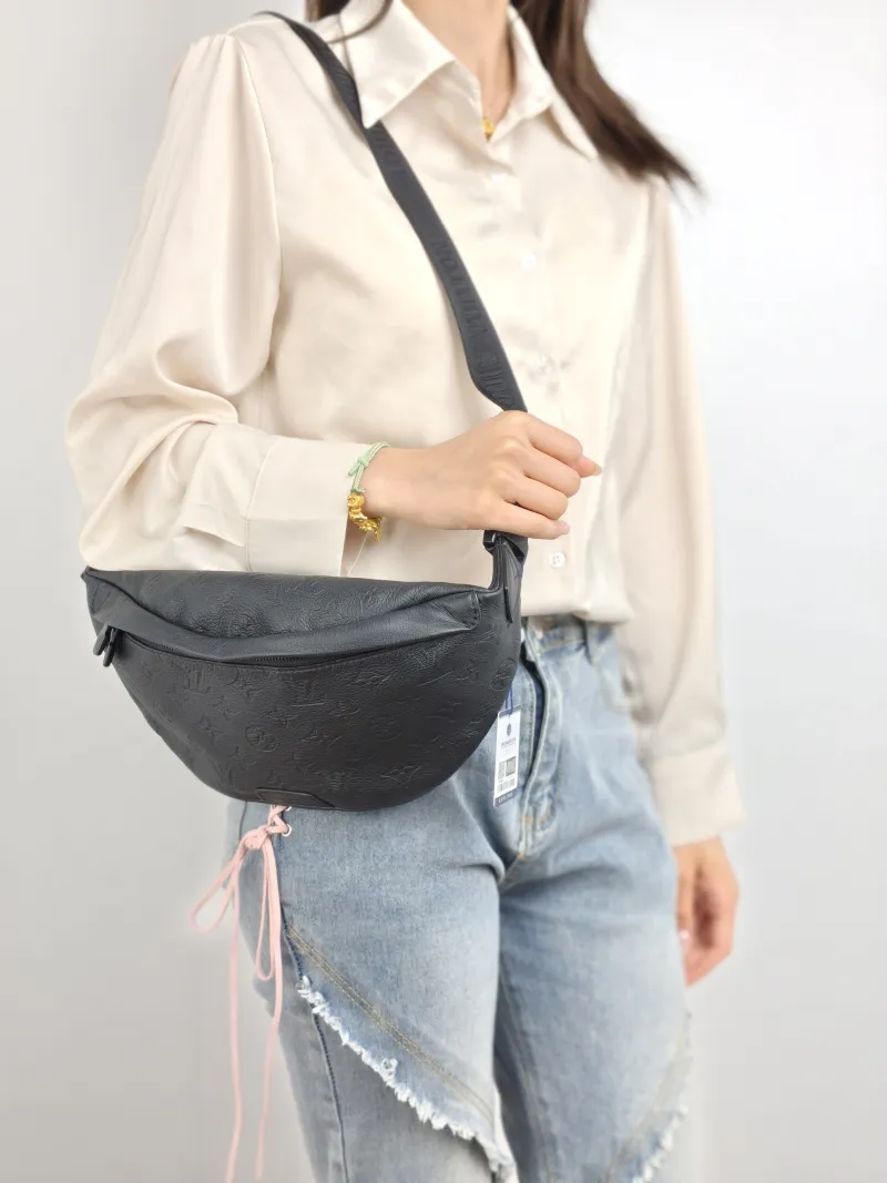Louis Vuitton Belt Bag DISCOVERY Belt Bag Black Calfskin Small 44 × 9 × 15 cm — on-model view 2 of 2