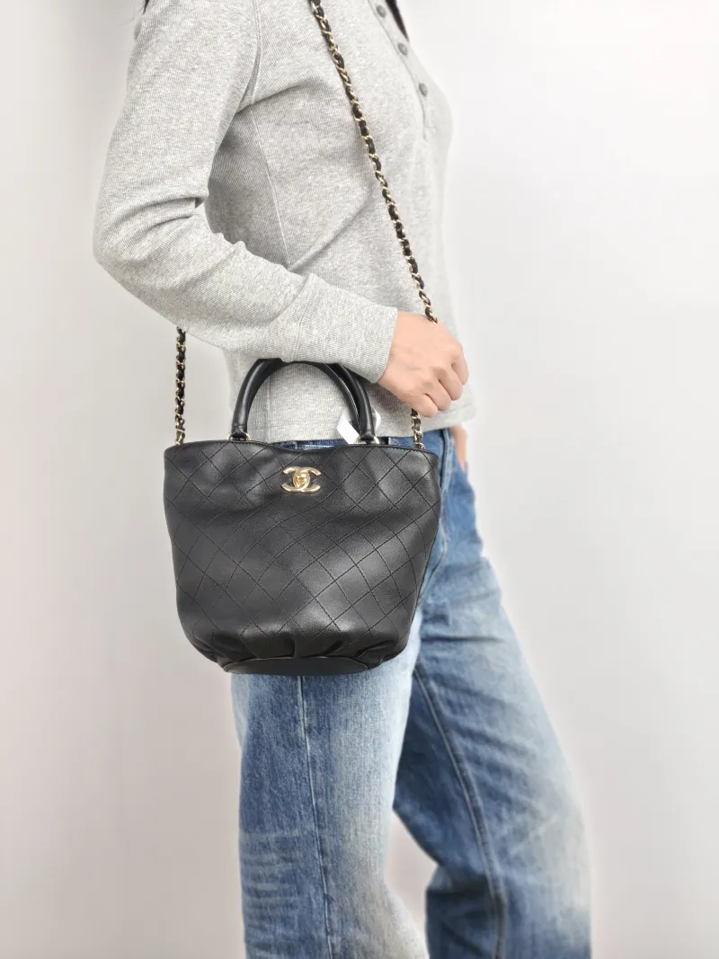 Chanel Shoulder Bag Bucket Bag Black Calfskin One Size 25 × 14 × 20 cm 27 — on-model view 1 of 2