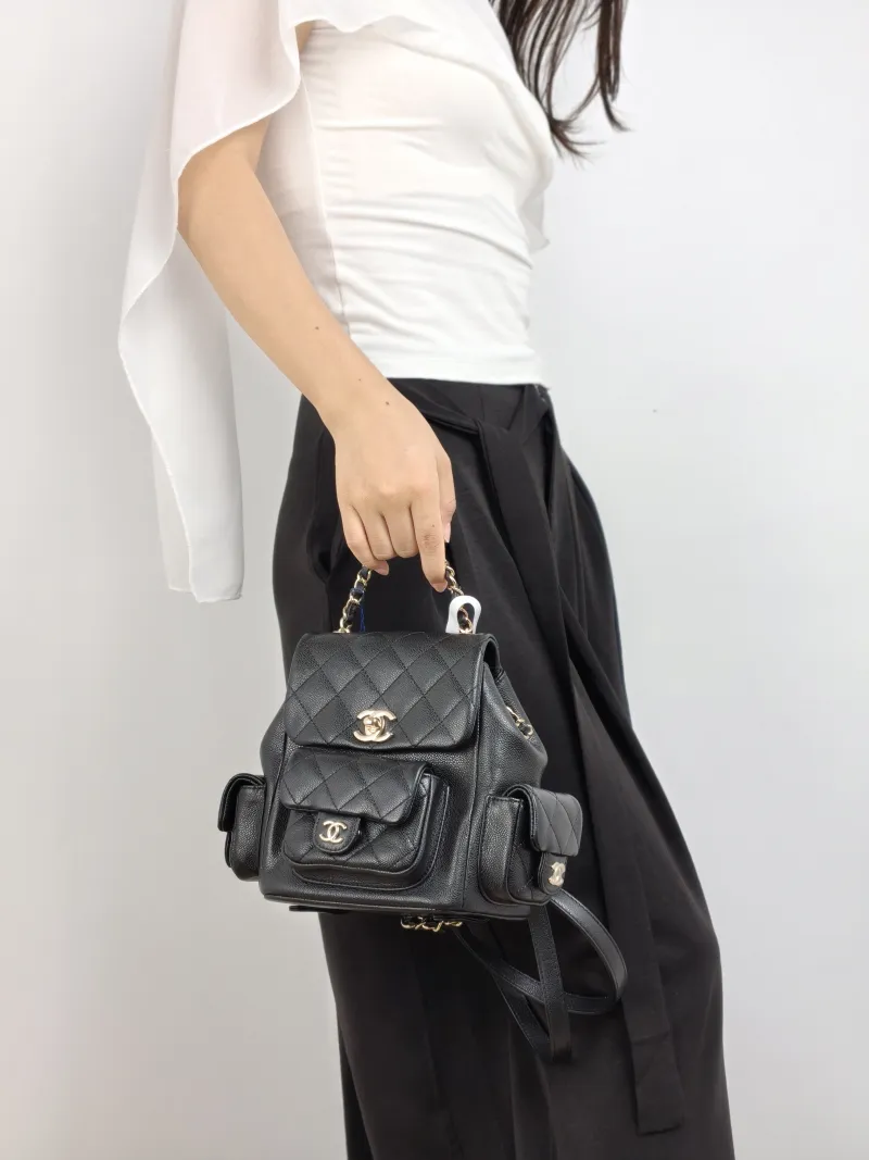 Chanel Backpack duma Black Grained Calfskin Small 18 × 9.5 × 19 cm — on-model view 1 of 3