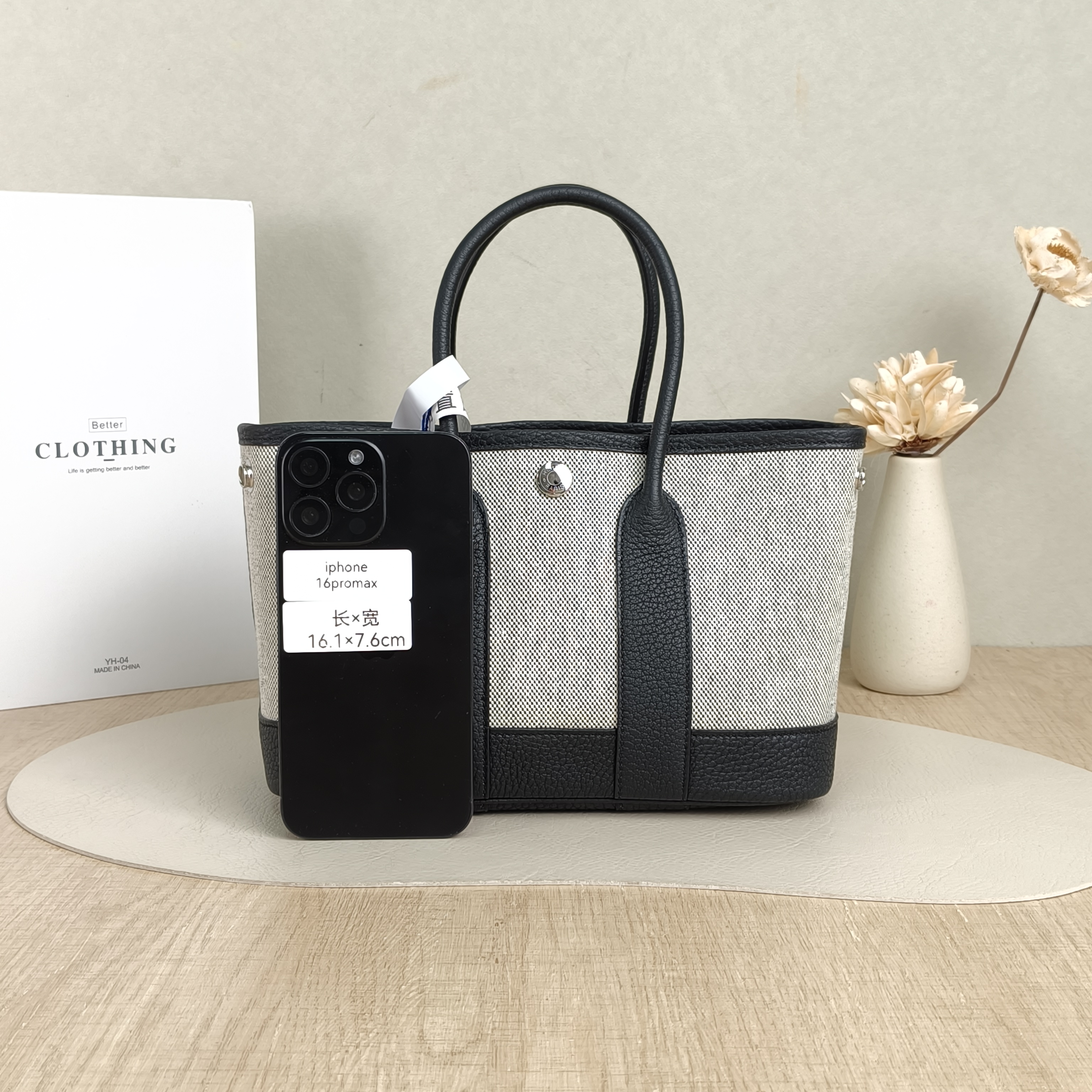 Hermès Top Handle Bag Neo Garden 23 Mini Black · Beige Canvas · Negonda Calfskinmini23 × 10 × 16 cm — cover view 3 of 6