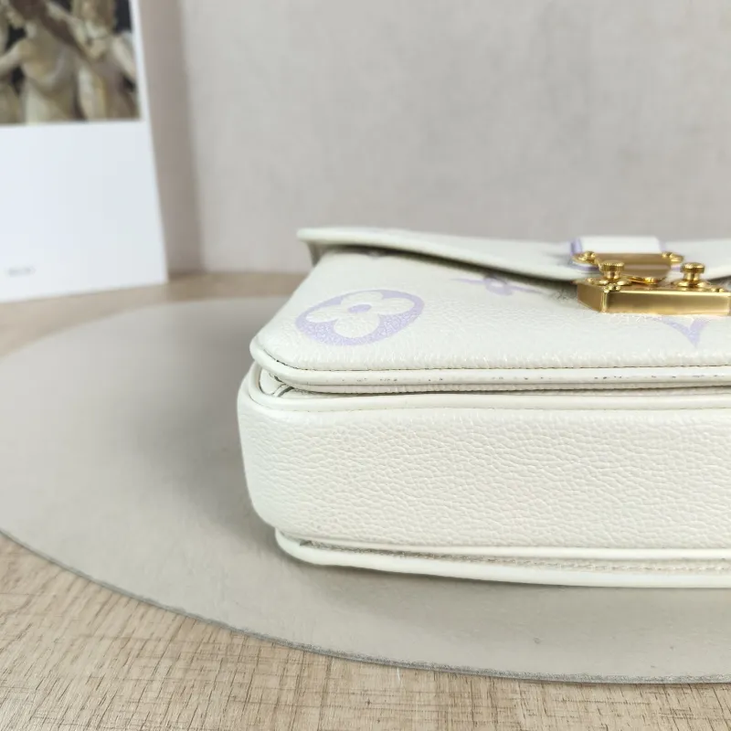 Louis Vuitton Crossbody Bag Pochette Métis East West White · Monogram Empreinte Embossed Calfskin Small 21.5 × 6 × 13.5 cm — detail view 2 of 11