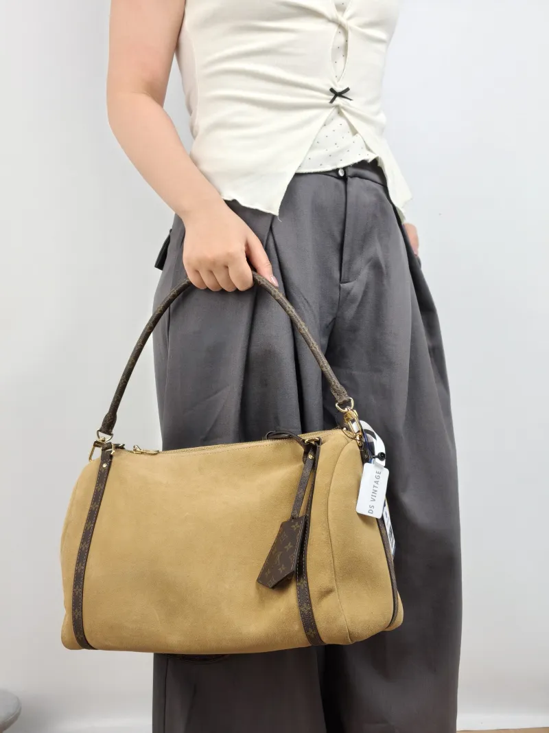 Louis Vuitton Shoulder Bag EXPRESS Shoulder Bag Suede Medium 36 × 18.5 × 24 cm — on-model view 2 of 2