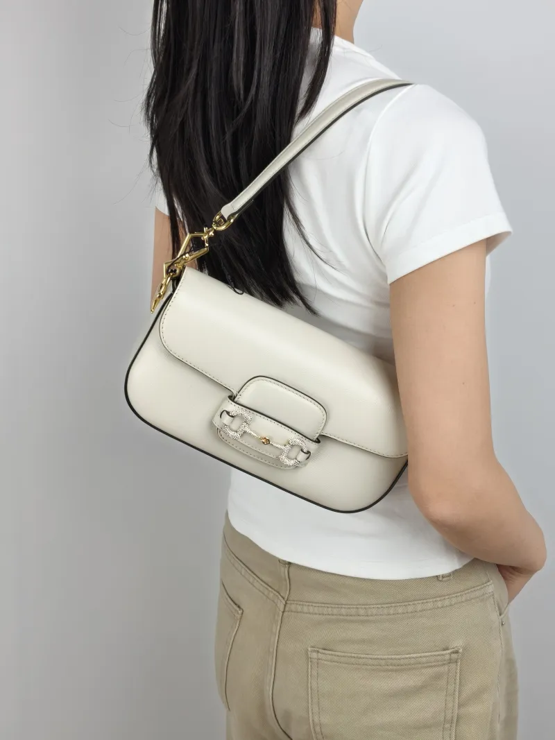 GUCCI Crossbody Bag Horsebit 1955 Horsebit Small White Calfskin Small 24 × 5.5 × 13 cm — on-model view 2 of 3