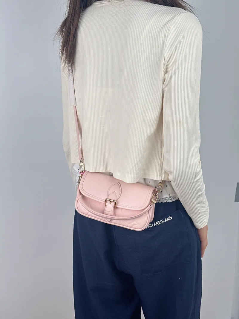 Louis Vuitton Crossbody Bag Diane Baguette Bag Monogram Empreinte Embossed Calfskin nano 19 × 6 × 10.5 cm — on-model view 2 of 2