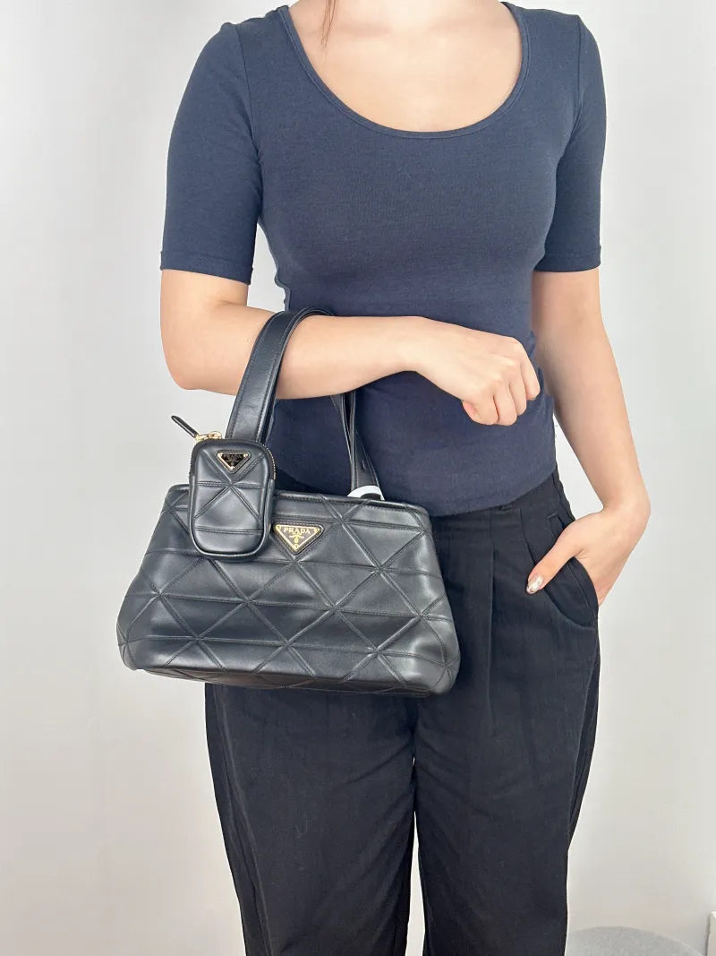 PRADA Top Handle Bag Tote Bag Black Calfskin One Size 29 × 15 × 17 cm — on-model view 1 of 2