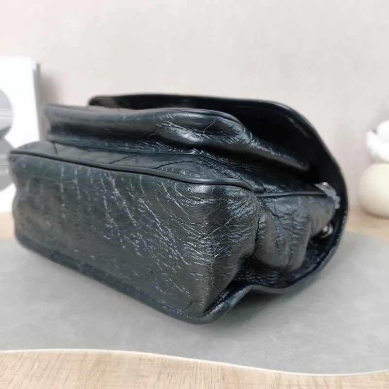 SAINT LAURENT Crossbody Bag Niki Green Waxed Leather Medium 28 × 8.5 × 20 cm — detail view 8 of 15