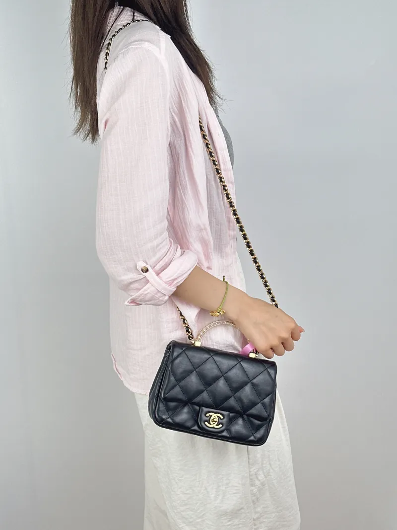 Chanel Crossbody Bag Black Lambskinmini19 × 6 × 12 cm — on-model view 2 of 3